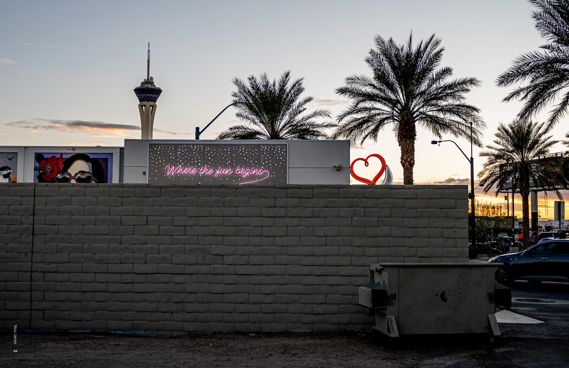 Image of a wall with a sign behind it which says 